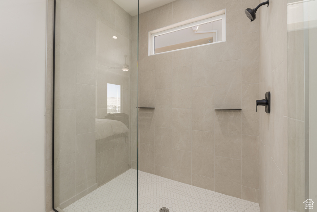 Bathroom with a shower with shower door