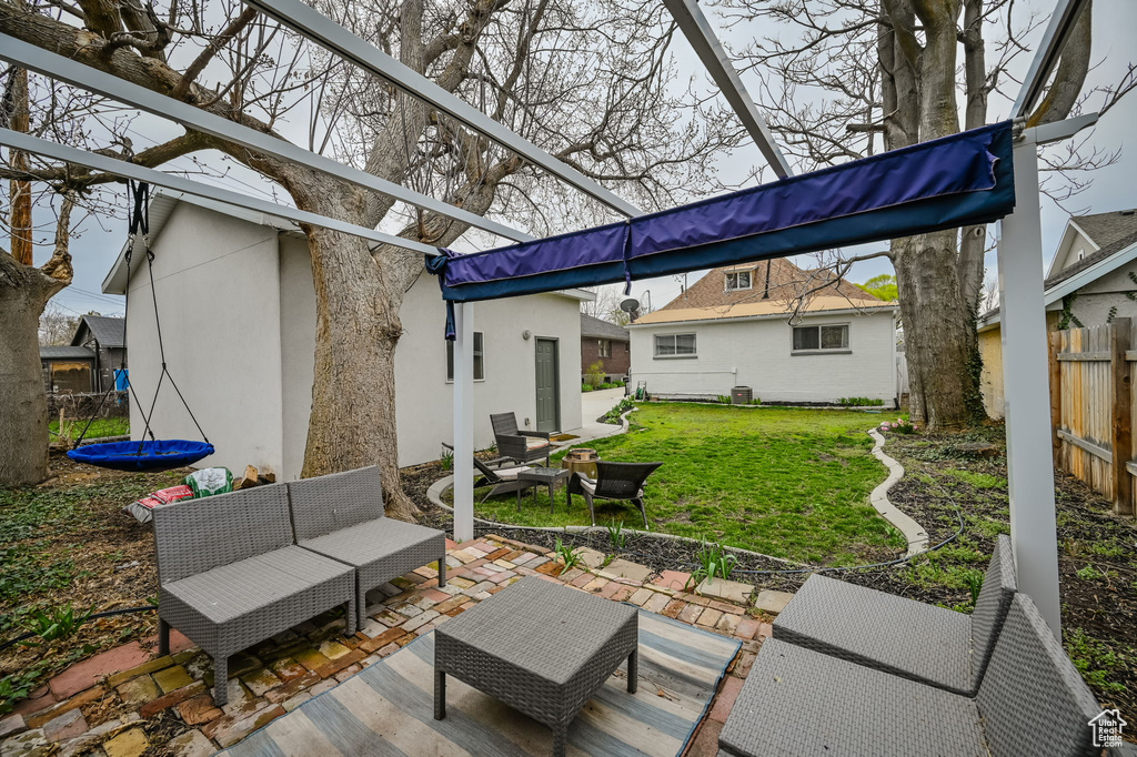 View of terrace featuring an outdoor hangout area and a trampoline