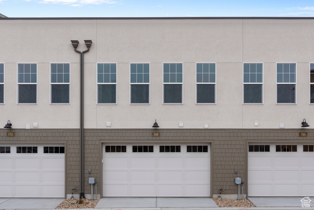 Multi unit property featuring a garage