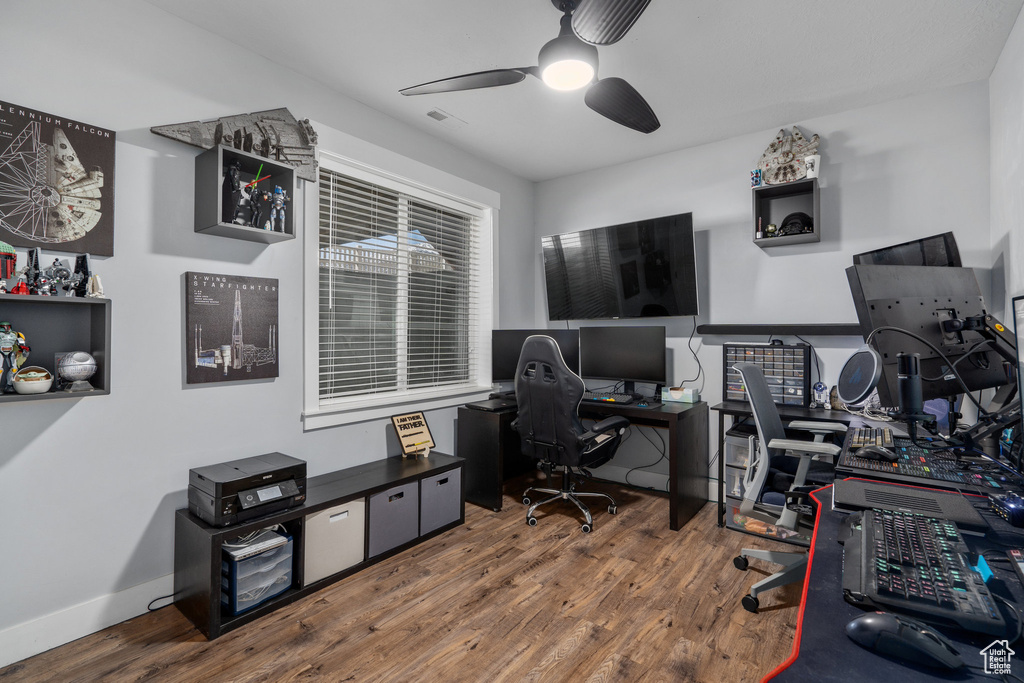 Office area featuring ceiling fan and hardwood / wood-style flooring