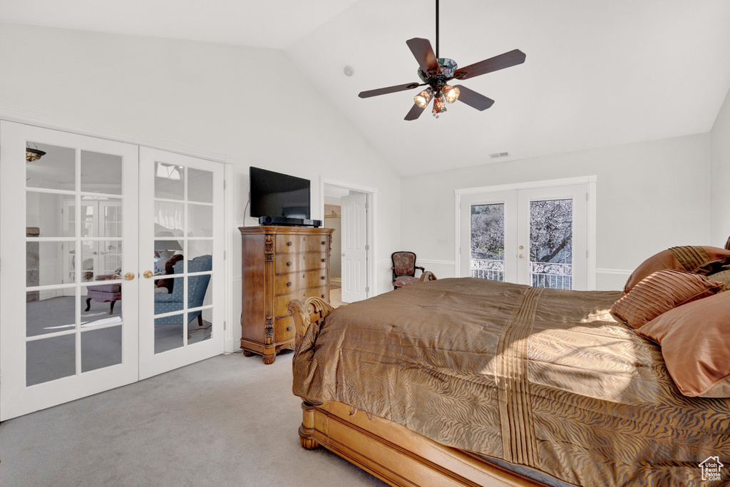 Carpeted bedroom featuring access to outside, high vaulted ceiling, ceiling fan, and french doors