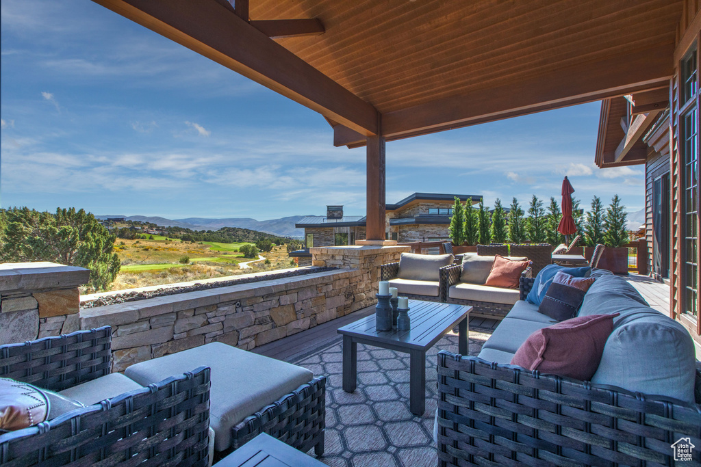 View of patio / terrace featuring outdoor lounge area and a mountain view