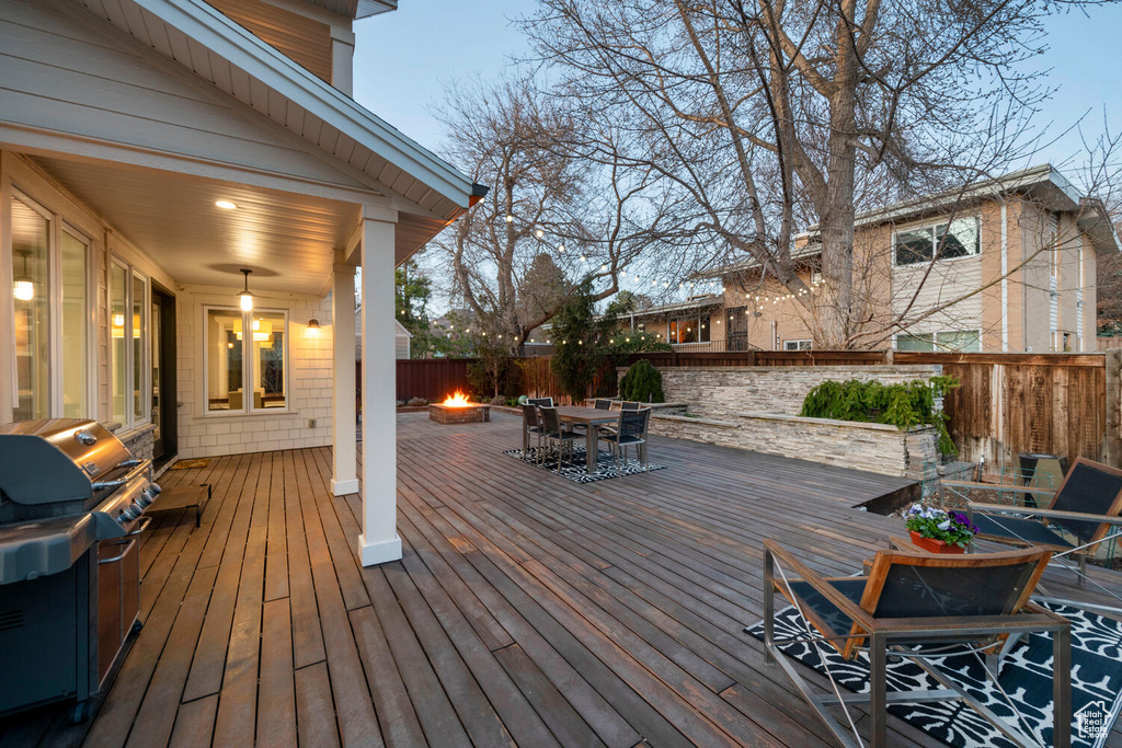Deck featuring a fire pit