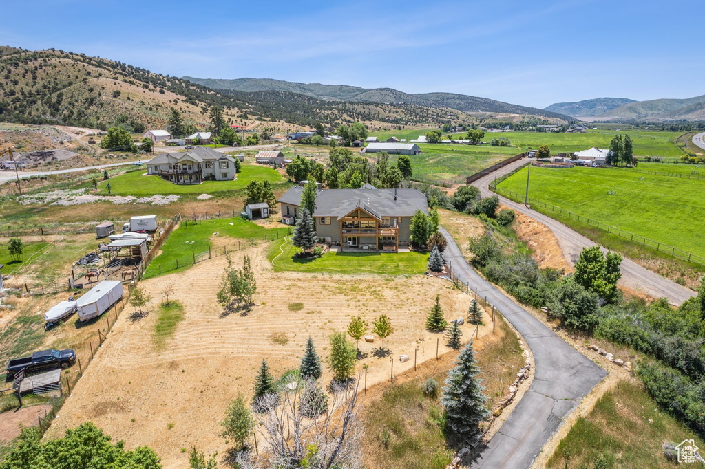 Birds eye view of property featuring a mountain view