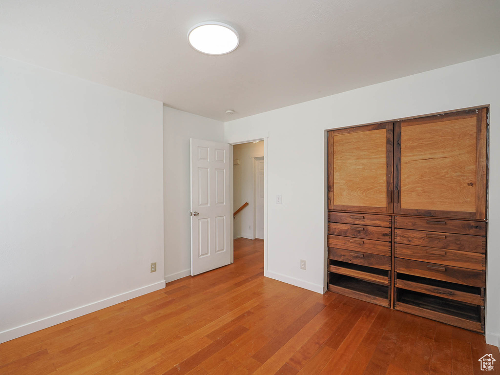 Unfurnished bedroom featuring light hardwood / wood-style floors