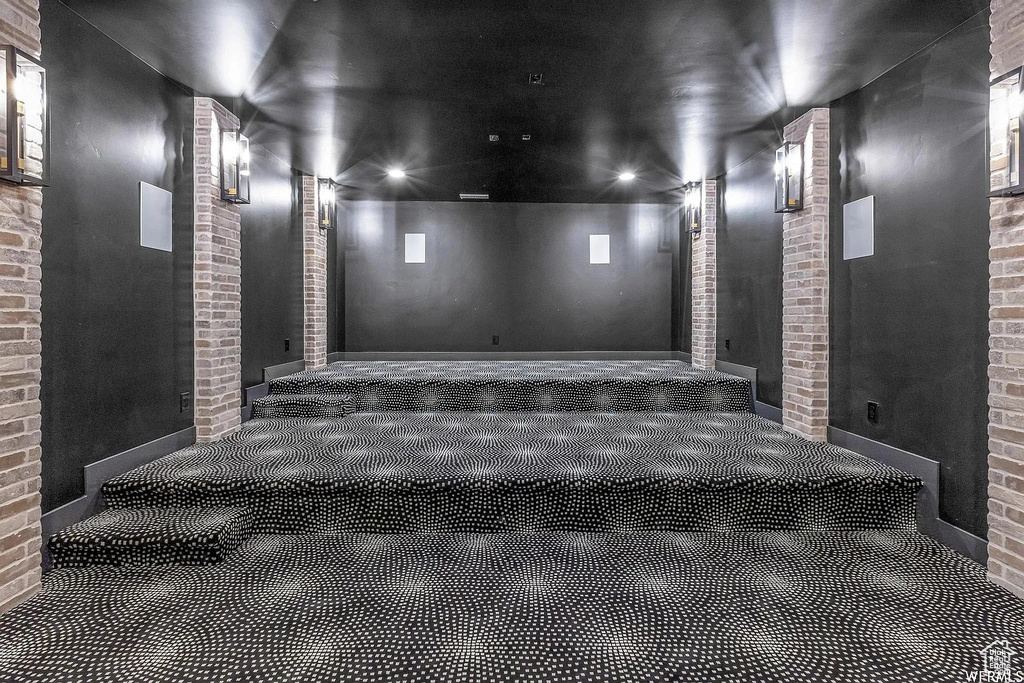 Cinema room with brick wall