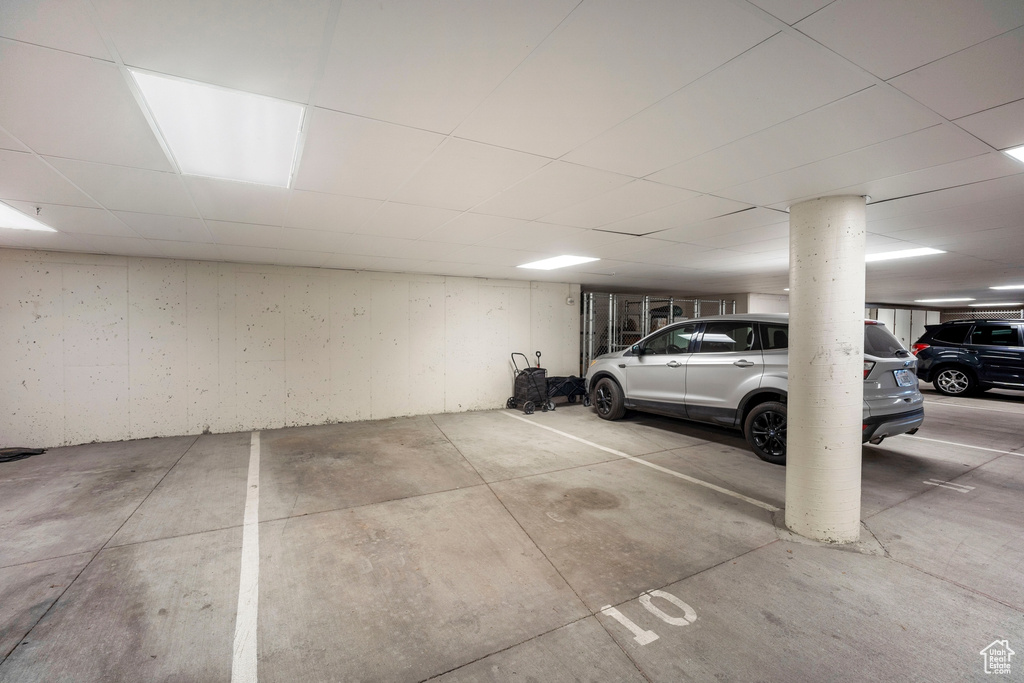 Garage featuring a carport