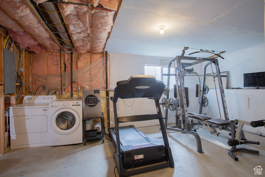 Exercise area with washing machine and dryer
