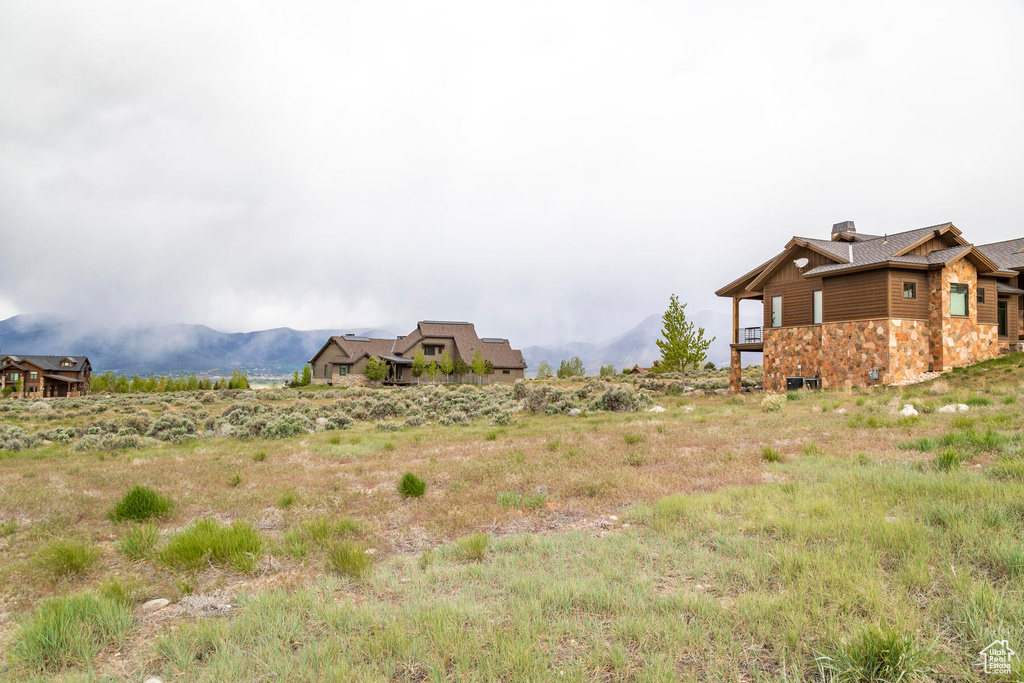 Exterior space featuring a mountain view