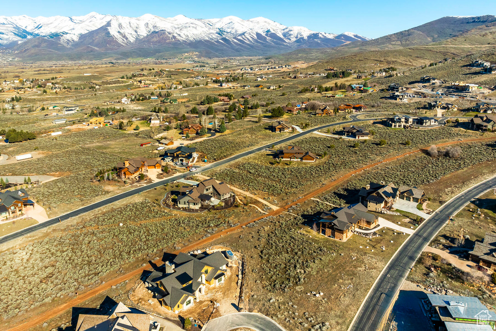 Birds eye view of property featuring a mountain view