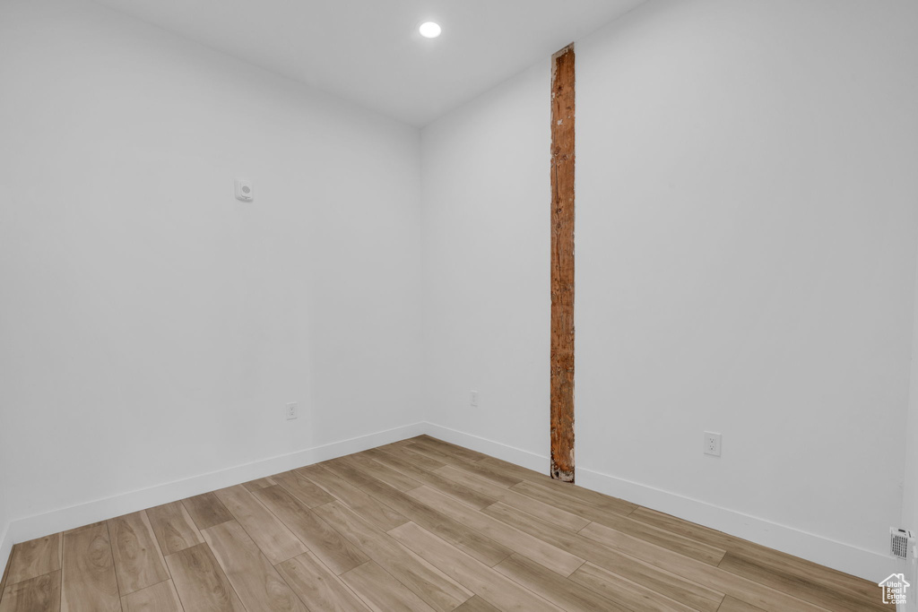 Empty room featuring light hardwood / wood-style flooring