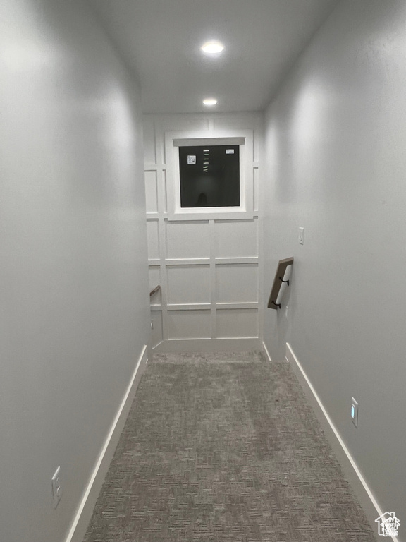 Corridor with carpet floors