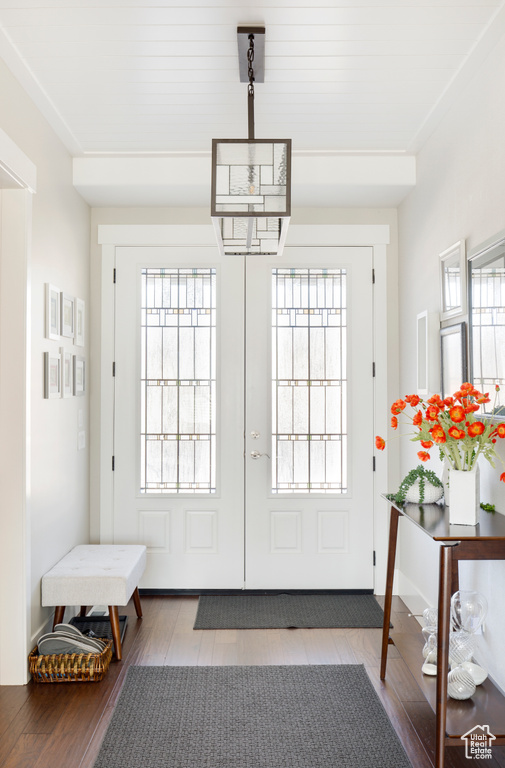 Entryway featuring french doors and wood-type flooring