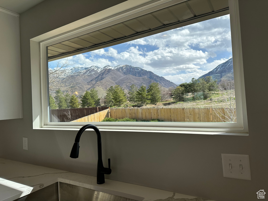 Details featuring a mountain view and sink