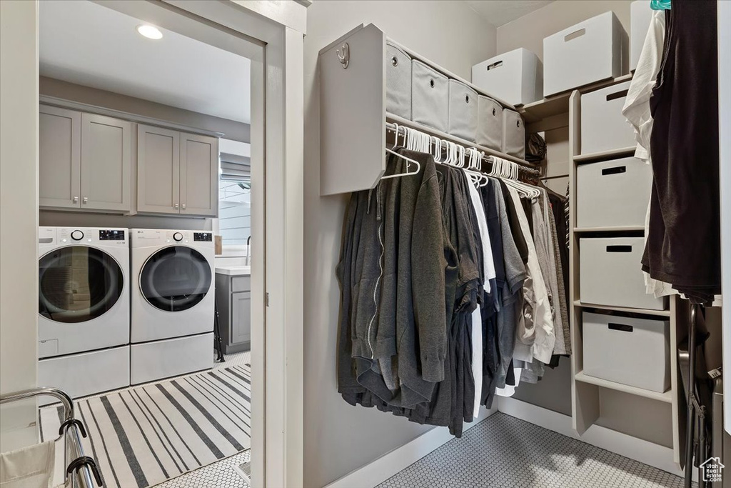 Spacious closet with separate washer and dryer