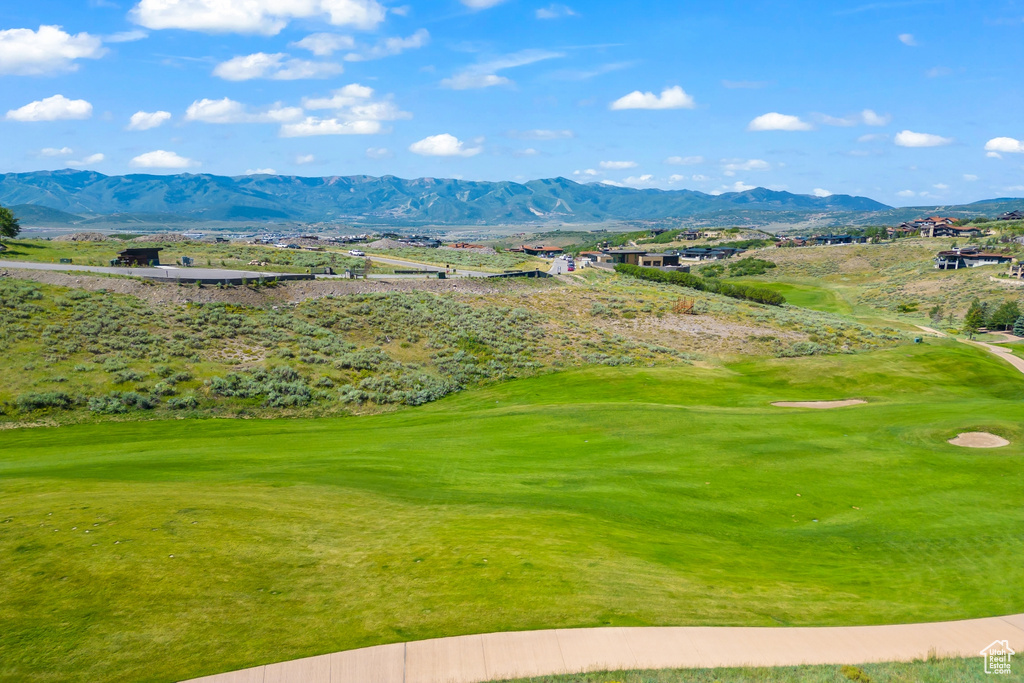 Surrounding community featuring a mountain view