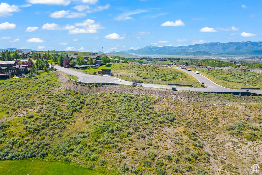 Birds eye view of property featuring a mountain view