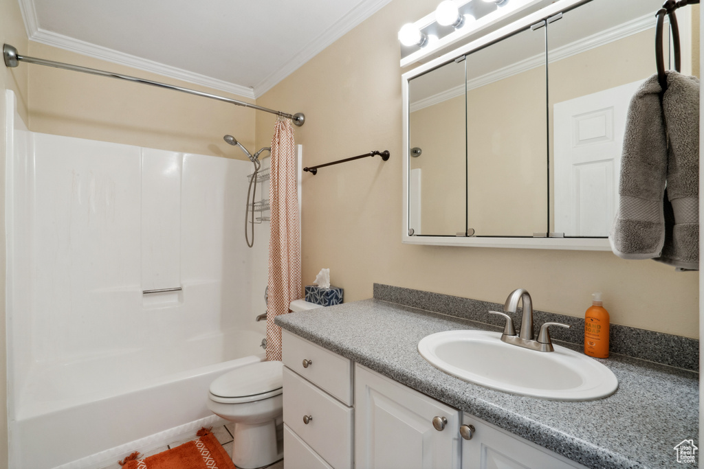Full bathroom with shower / bath combination with curtain, ornamental molding, toilet, and oversized vanity