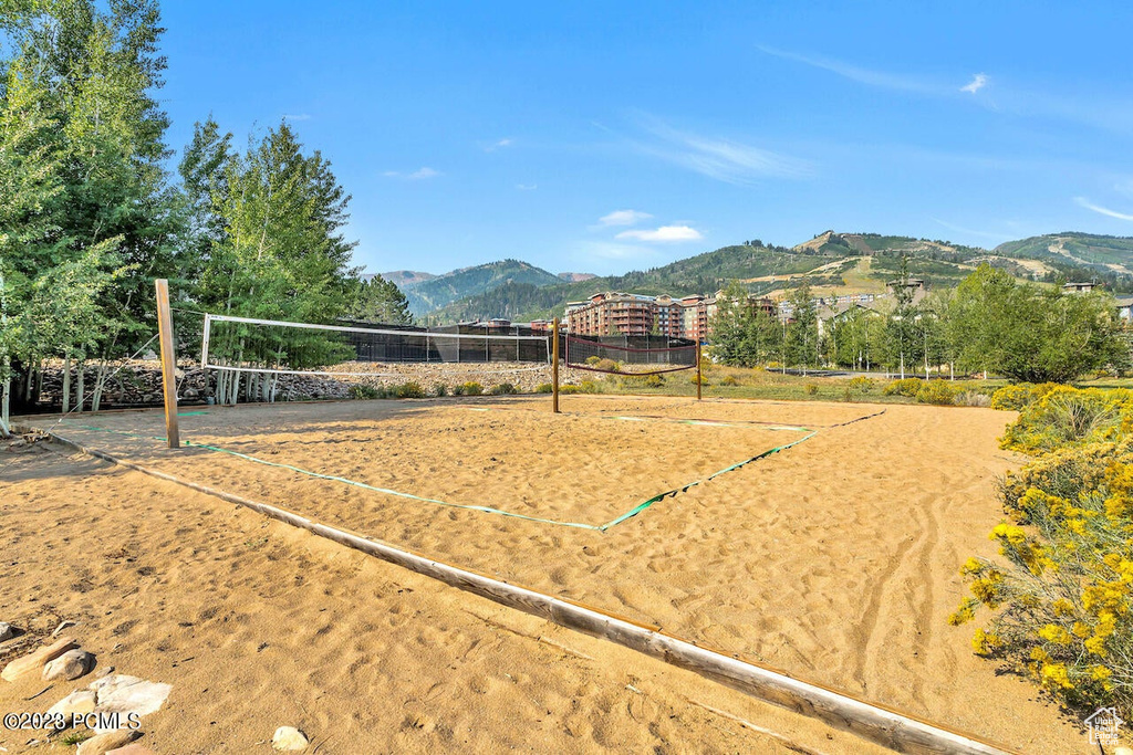 View of property's community featuring volleyball court and a mountain view