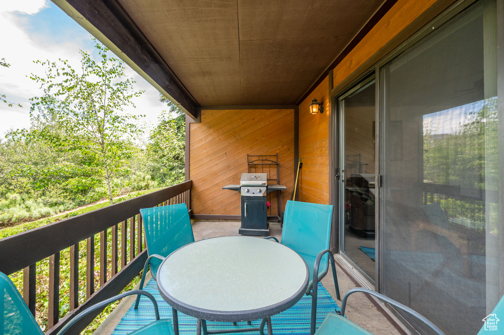Balcony featuring area for grilling