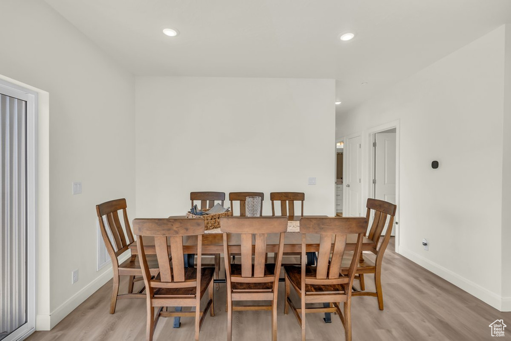 Dining area featuring light hardwood / wood-style flooring