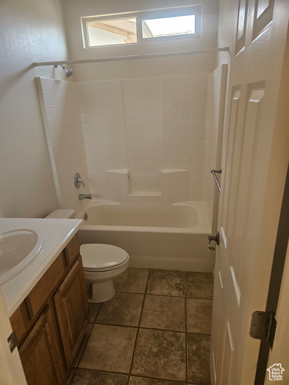 Full bathroom with shower / washtub combination, toilet, and vanity