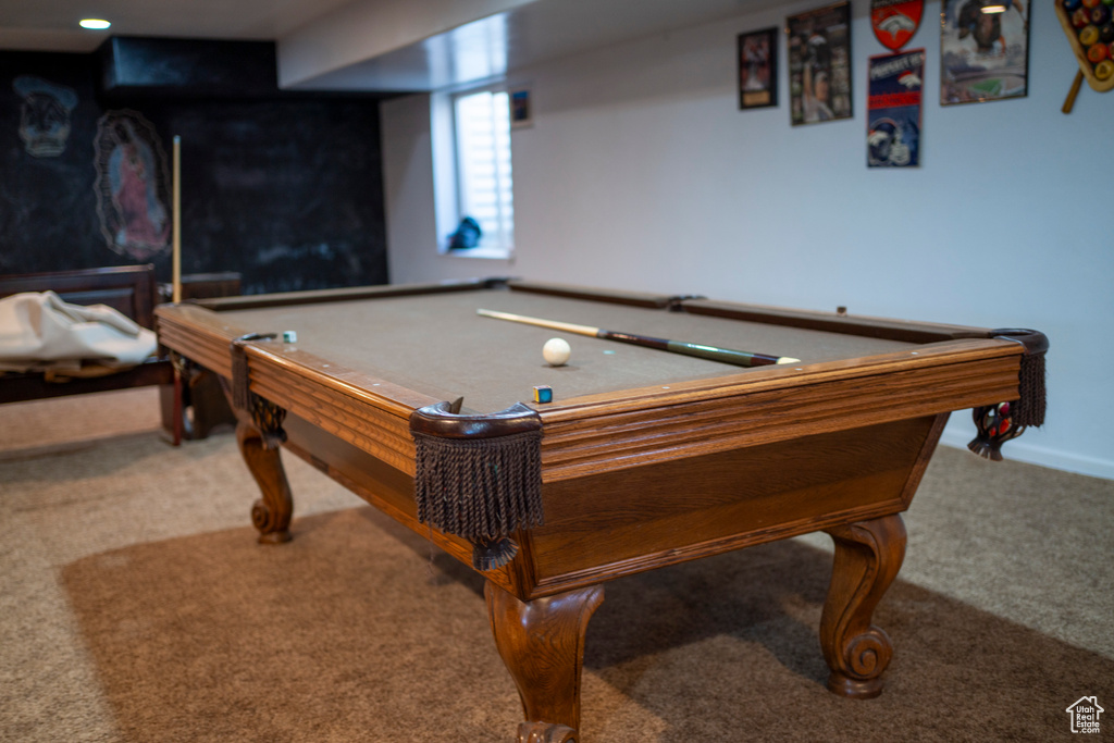 Game room with carpet and pool table