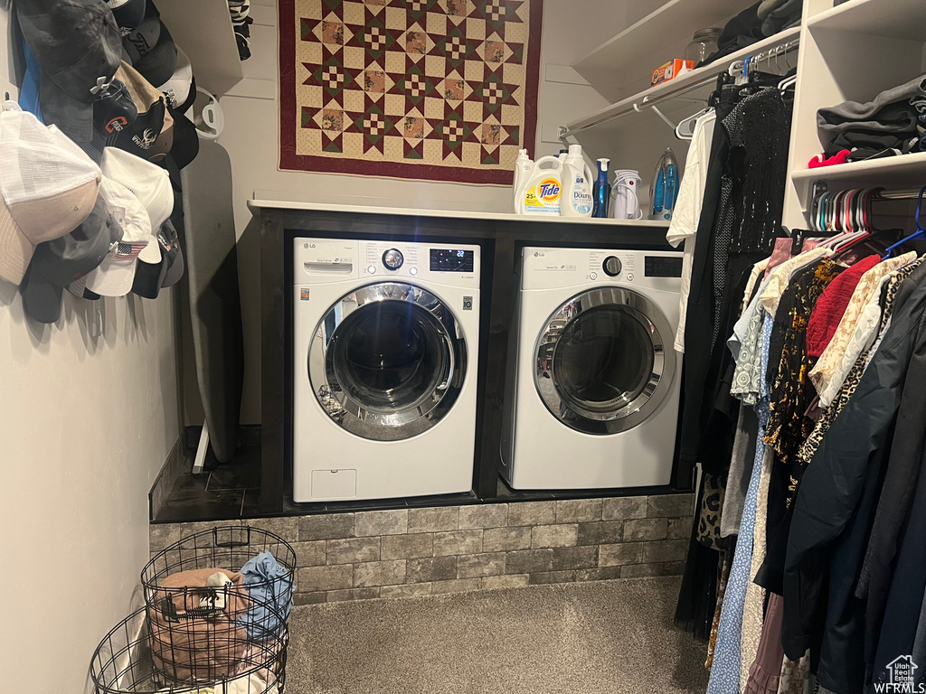 Clothes washing area with washing machine and dryer and carpet