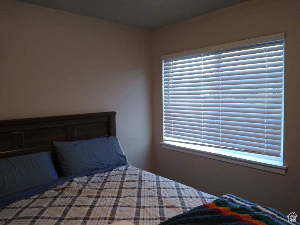 Unfurnished bedroom featuring multiple windows