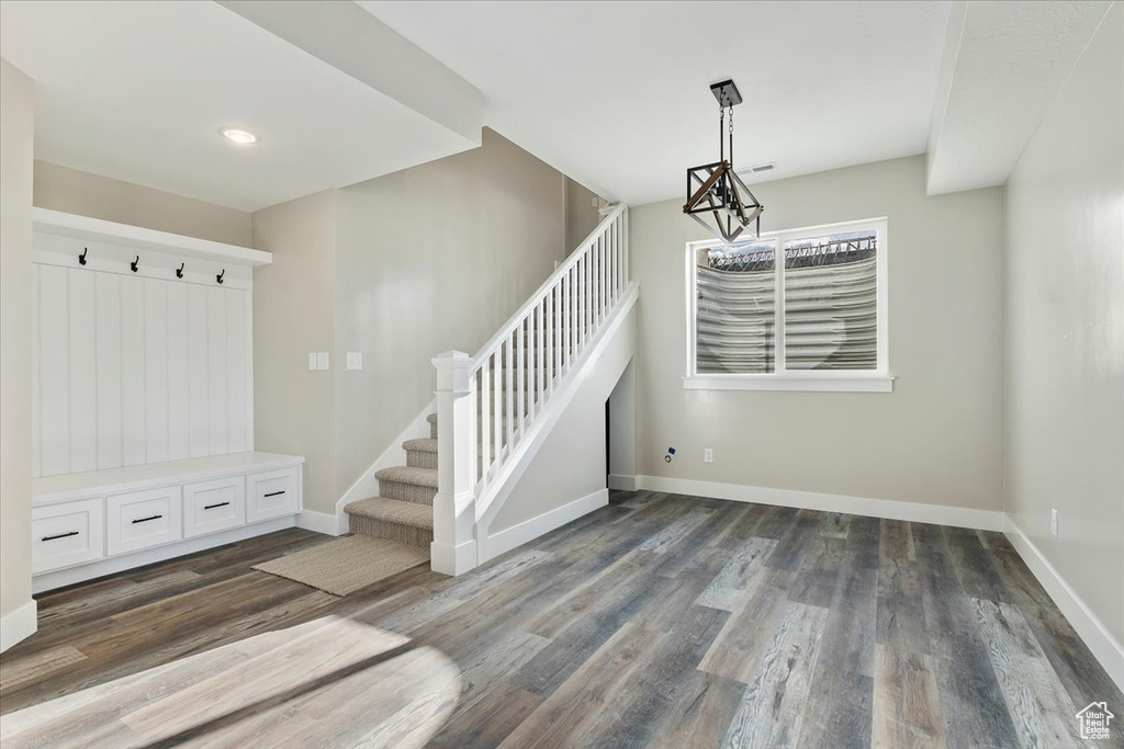 Interior space featuring dark wood-type flooring