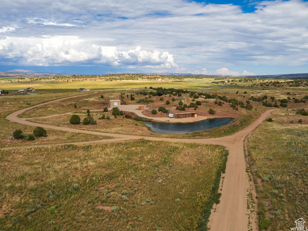 Bird's eye view with a rural view and a water view