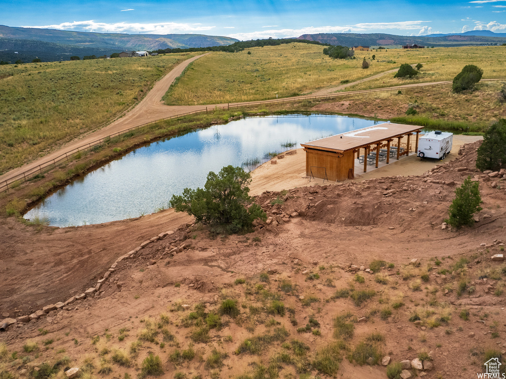 Bird's eye view featuring a water and mountain view and a rural view