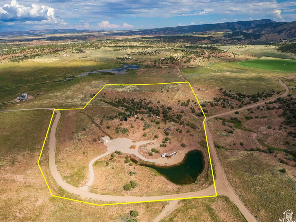 Aerial view with a mountain view and a rural view