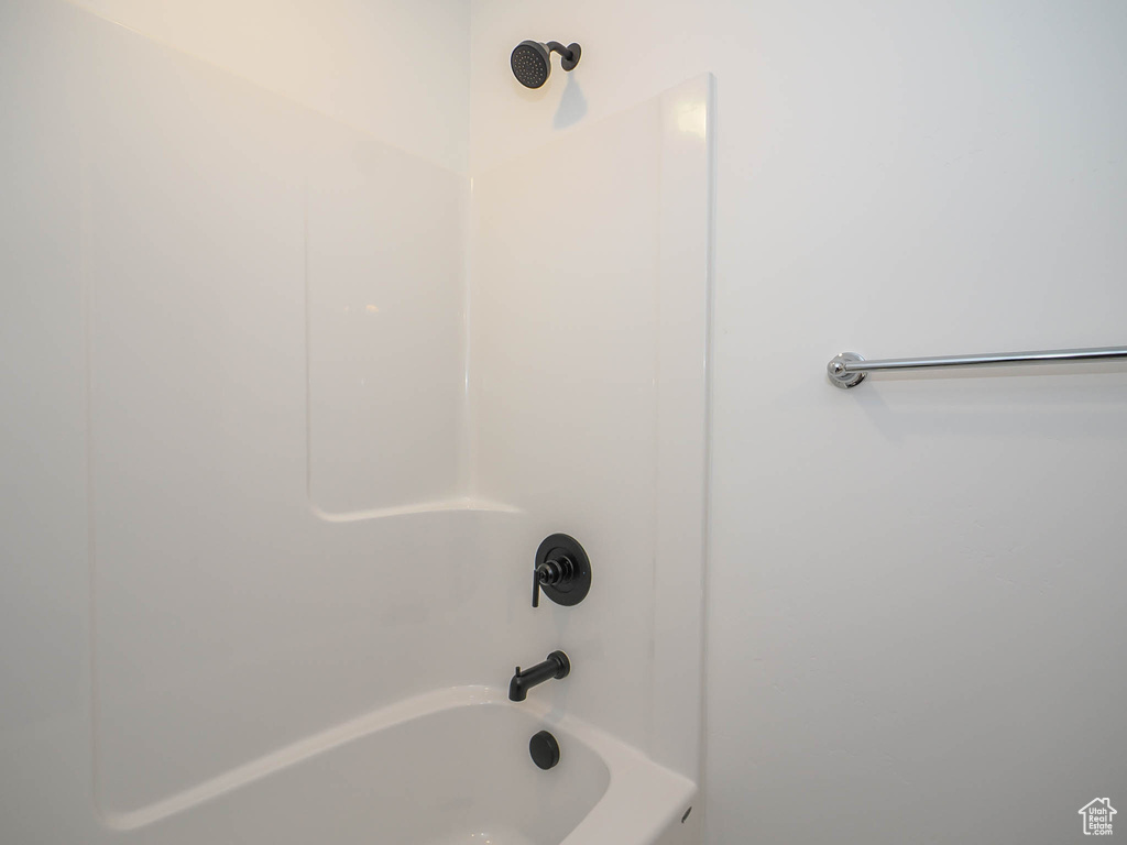 Bathroom with shower / washtub combination