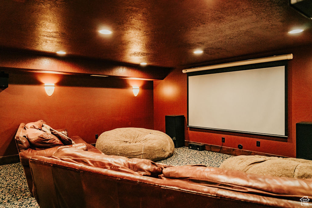 Home theater room featuring carpet flooring