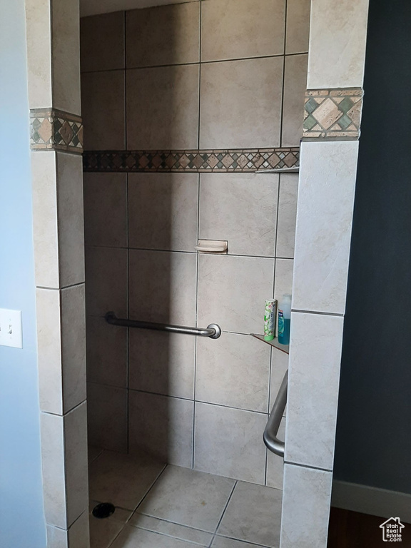Bathroom with tiled shower
