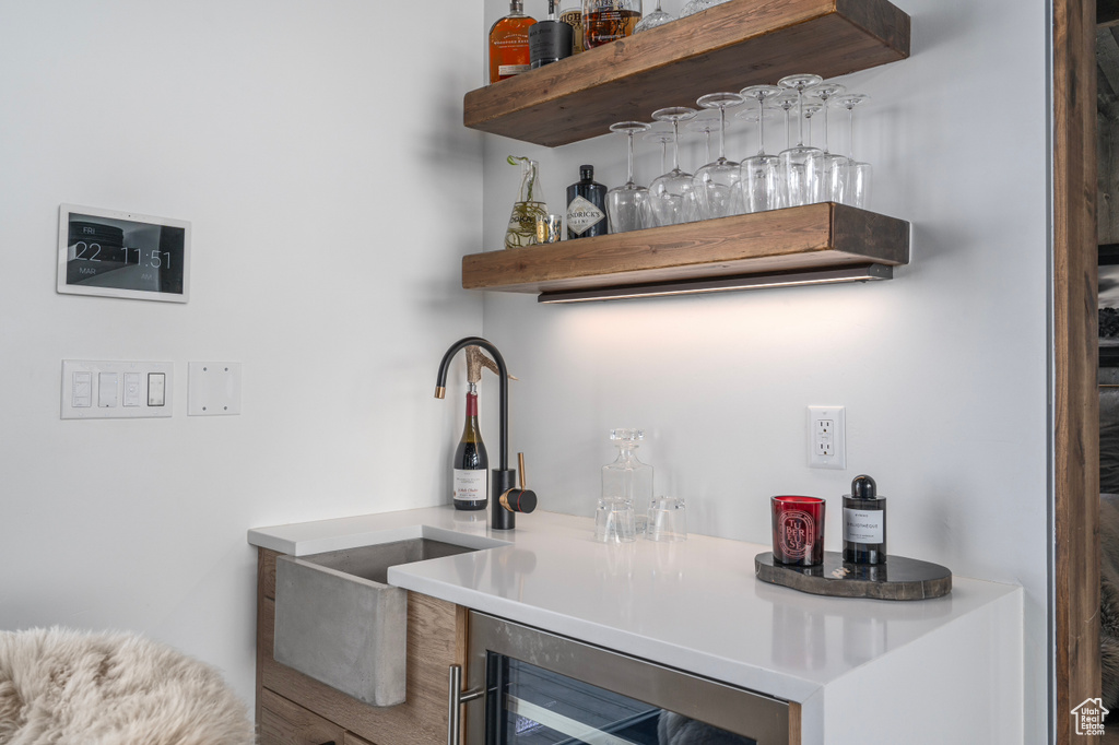 Bar with sink and beverage cooler