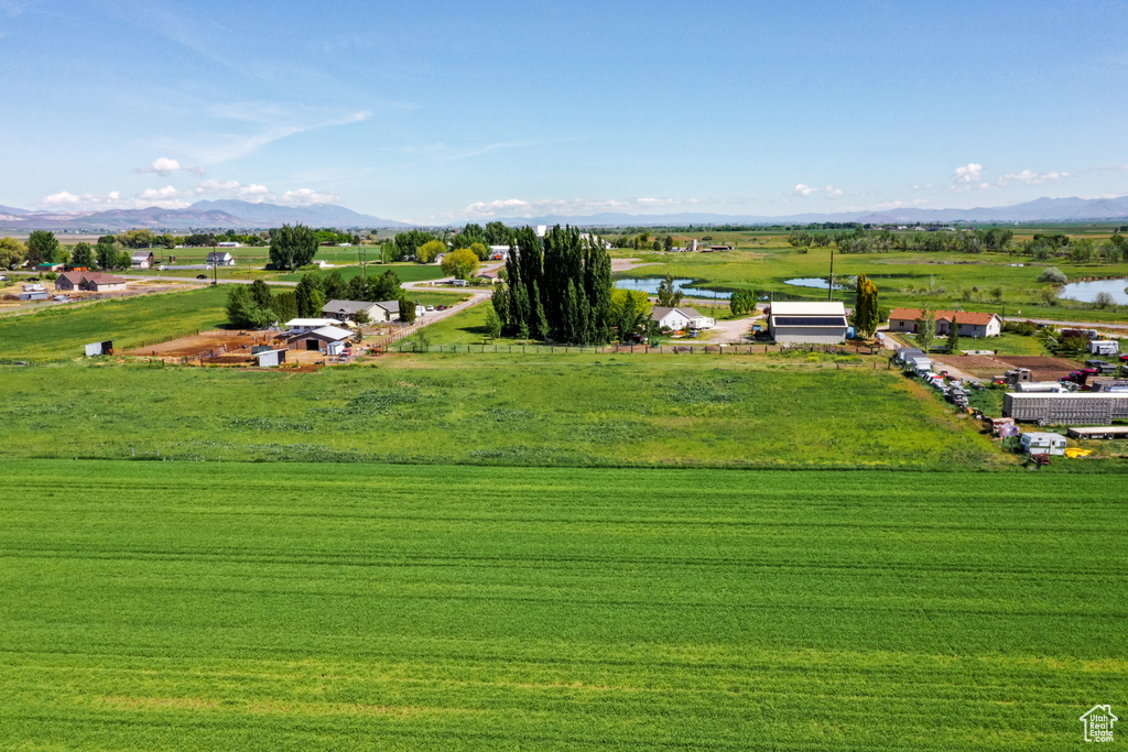 Birds eye view of property featuring a rural view and a water and mountain view