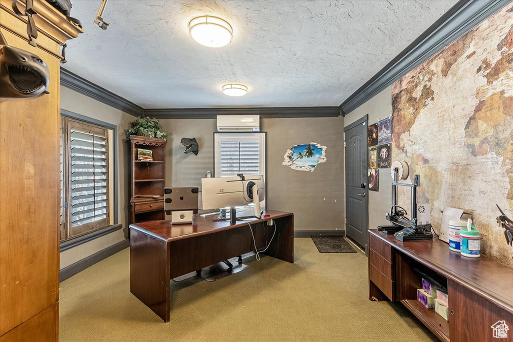 Carpeted office space featuring an AC wall unit and ornamental molding