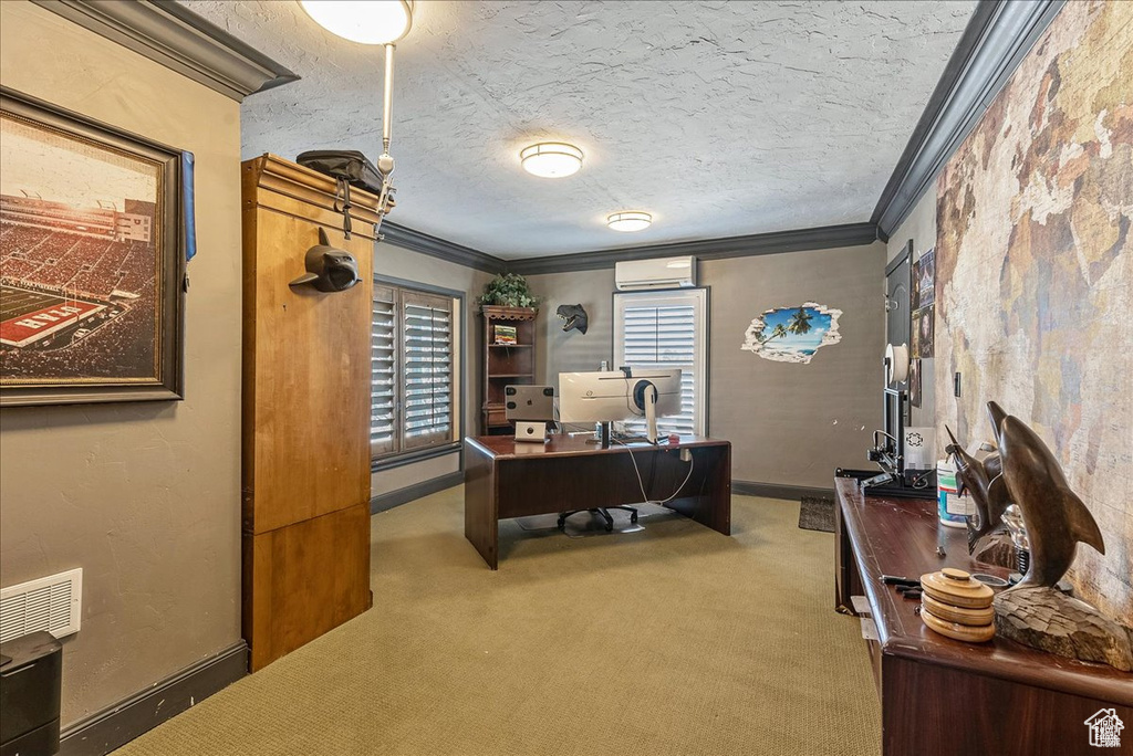 Carpeted home office featuring crown molding, a wall unit AC, and a wealth of natural light