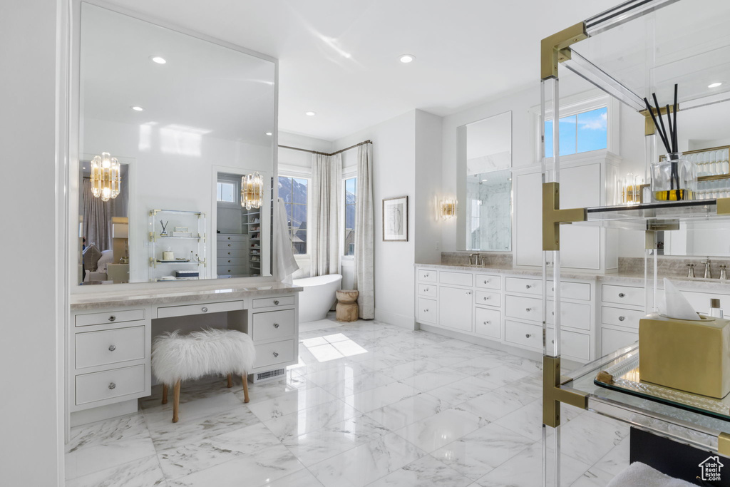 Bathroom featuring a bidet, tile flooring, and vanity