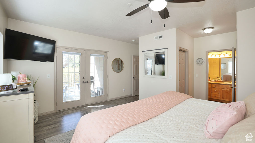 Bedroom with access to exterior, ceiling fan, french doors, hardwood / wood-style flooring, and ensuite bathroom
