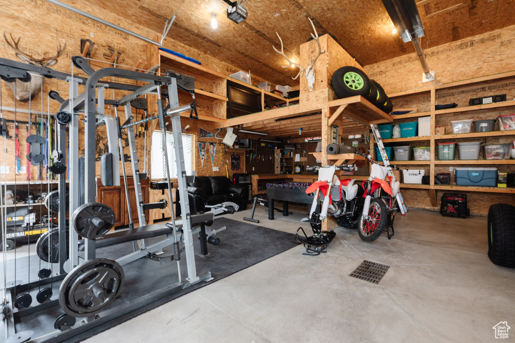 Workout room with a workshop area