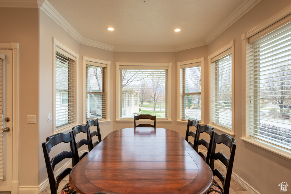 Dining area with crown molding