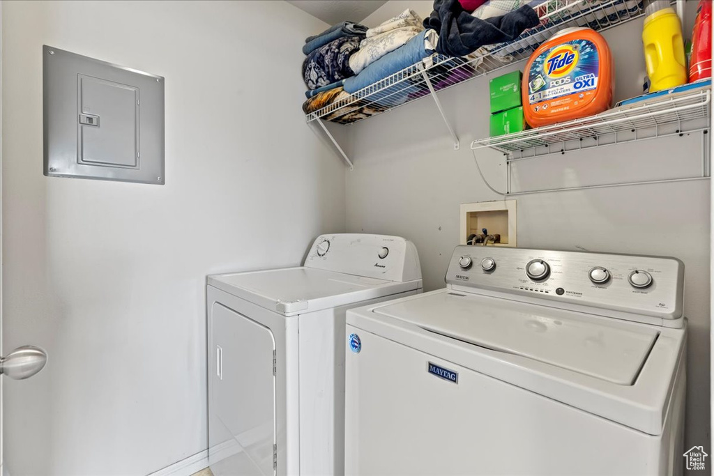 Laundry room with washer and dryer and hookup for a washing machine