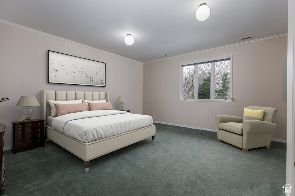 Bedroom featuring dark carpet and crown molding