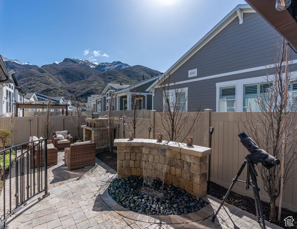 View of patio with a mountain view