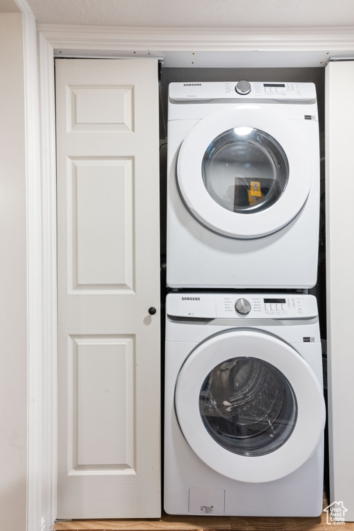 Washroom with stacked washer and dryer