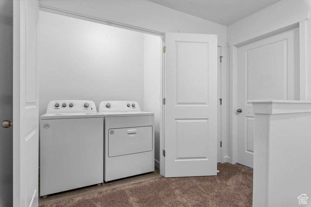 Laundry area featuring washer and clothes dryer