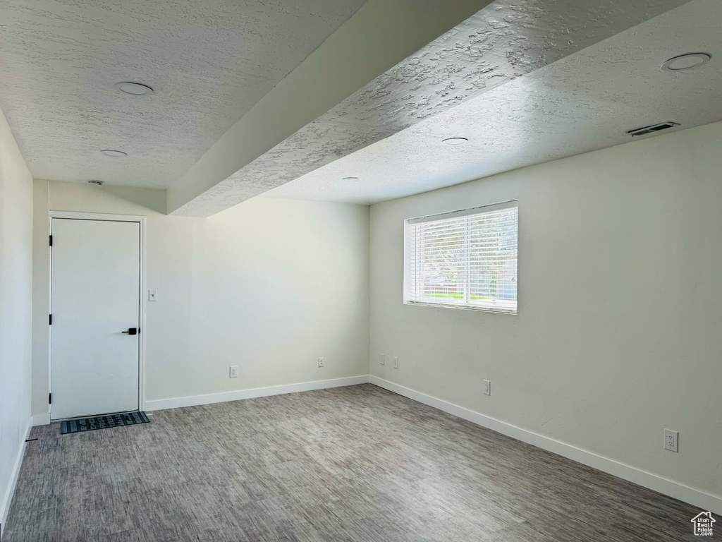 Spare room with a textured ceiling